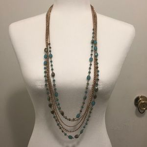 Necklace 5 Gold Tone Strands, two with glass beads